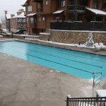 Outdoor pool area of a house with snowmelt system installed.