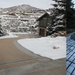 Slanted driveway with snowmelt system installed.